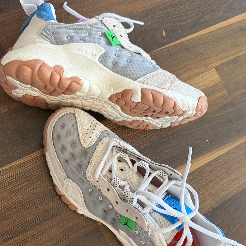 Jordan Gray and White Sneakers with Blue Accents
